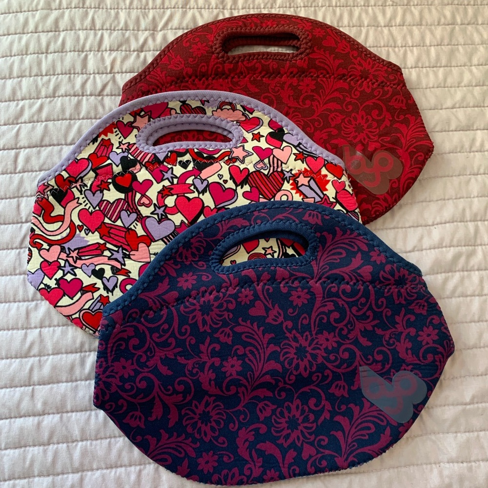 3 BYO neoprene lunch bags. Stain on the light purple. Torn tag. See photos.